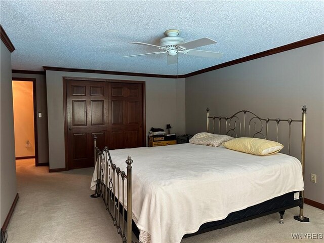 55 Hemlock Ln, Lancaster, NY 14086 - bedroom featuring light carpet, ornamental molding, baseboards, a ceiling fan, and a closet