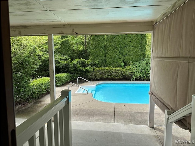 55 Hemlock Ln, Lancaster, NY 14086 - outdoor pool featuring a patio