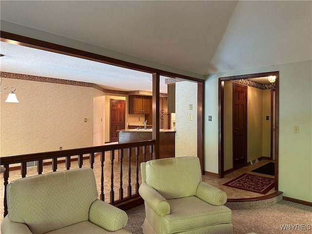 55 Hemlock Ln, Lancaster, NY 14086 - sitting room featuring light colored carpet and vaulted ceiling