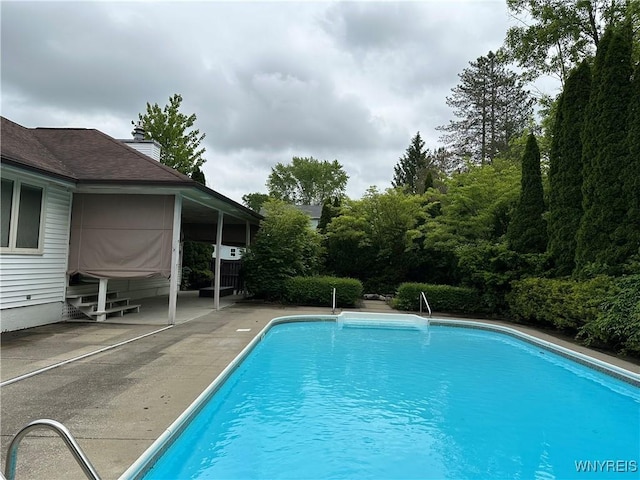 55 Hemlock Ln, Lancaster, NY 14086 - swimming pool featuring a patio