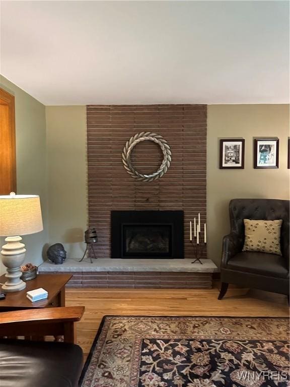 4710 Boncrest Dr E, Clarence, NY 14221 - living area with a fireplace and wood finished floors