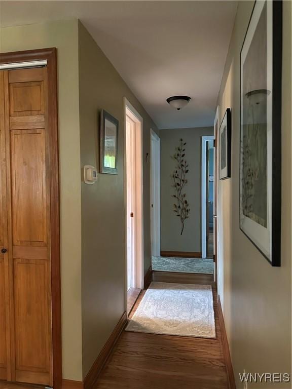 4710 Boncrest Dr E, Clarence, NY 14221 - hallway featuring wood finished floors and baseboards