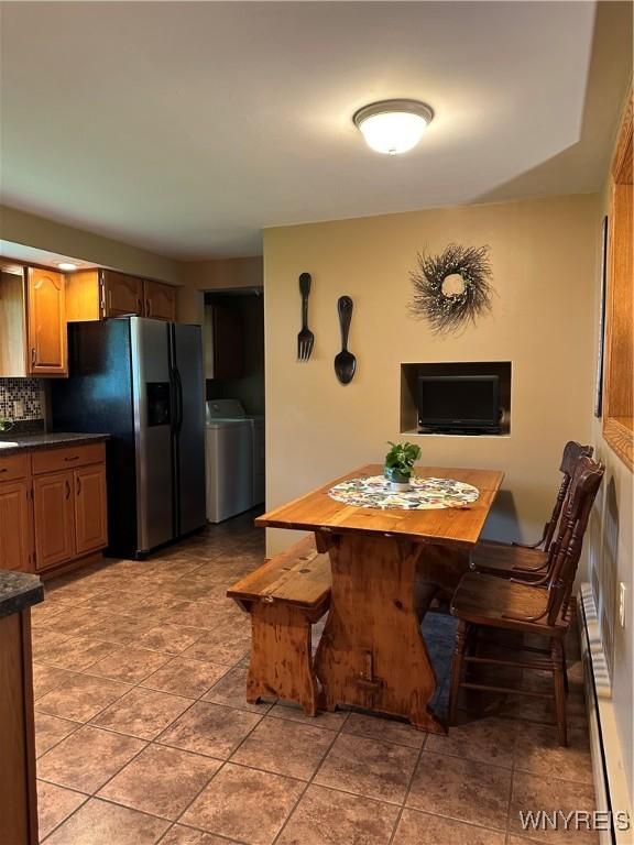 4710 Boncrest Dr E, Clarence, NY 14221 - dining area featuring washer / clothes dryer