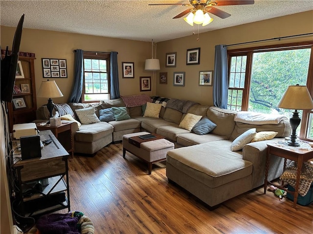390 Bolivar Dr, Foster-Town, PA 16701 - living area with a textured ceiling, a ceiling fan, and wood finished floors