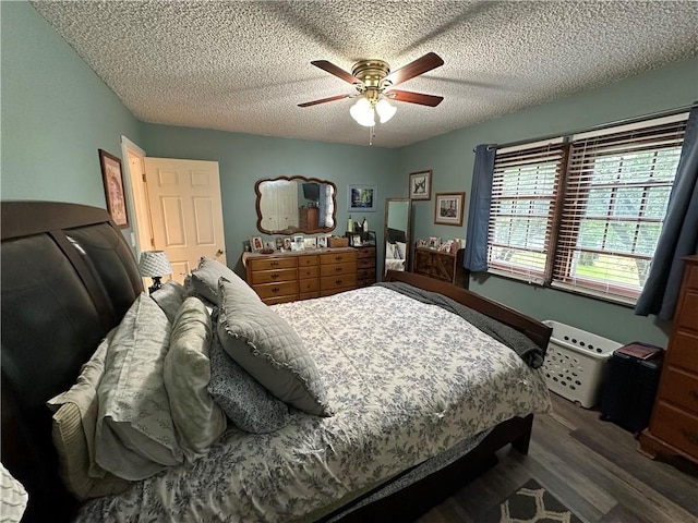 390 Bolivar Dr, Foster-Town, PA 16701 - bedroom with wood finished floors, ceiling fan, and a textured ceiling