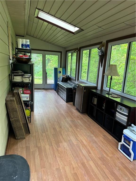 390 Bolivar Dr, Foster-Town, PA 16701 - sunroom with a skylight, healthy amount of natural light, lofted ceiling, and french doors