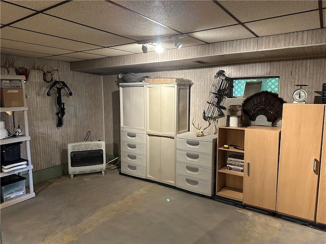390 Bolivar Dr, Foster-Town, PA 16701 - finished basement featuring heating unit, wooden walls, and a paneled ceiling