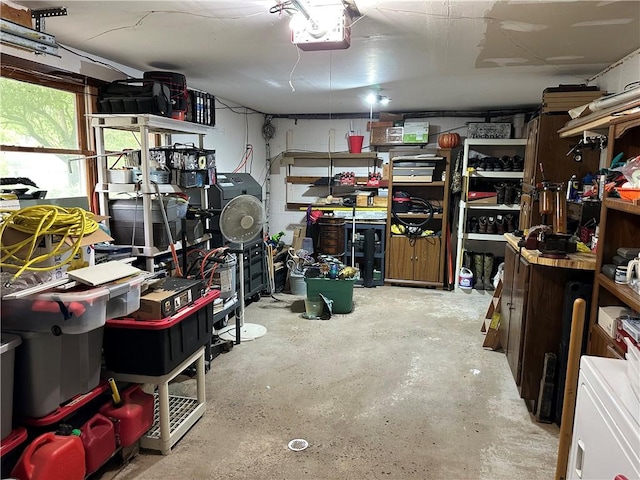 390 Bolivar Dr, Foster-Town, PA 16701 - garage featuring a garage door opener and a workshop area
