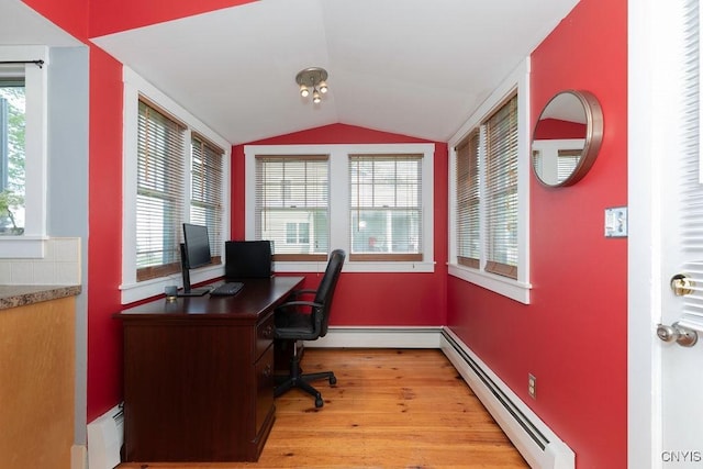 7649 Tuttle Rd, Cicero, NY 13030 - office space with a baseboard heating unit, lofted ceiling, wood finished floors, and a baseboard radiator