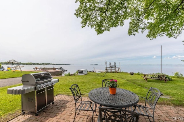 7649 Tuttle Rd, Cicero, NY 13030 - view of patio / terrace featuring area for grilling and a water view