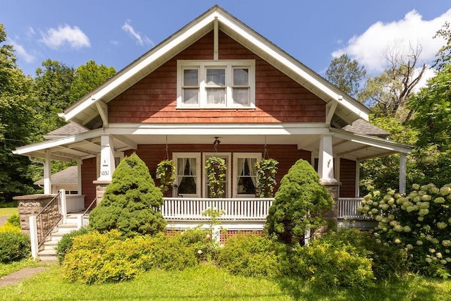 1031 Main St, Middletown, NY 12455 - view of front of property featuring covered porch and a shingled roof