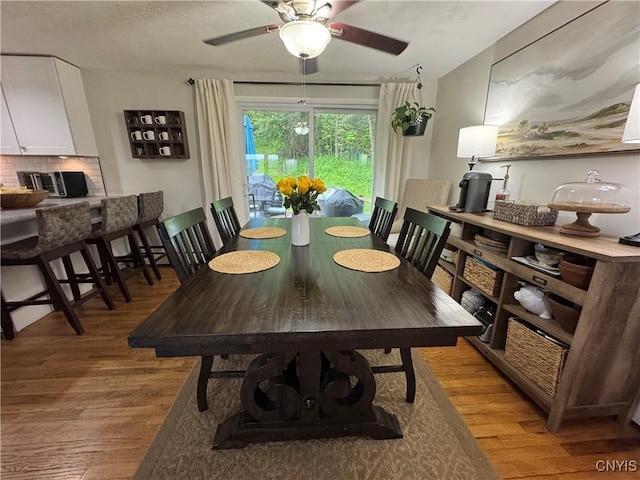 8521 Cazenovia Rd, Pompey, NY 13104 - dining space with light wood-style floors and ceiling fan
