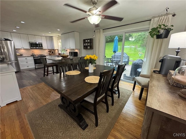 8521 Cazenovia Rd, Pompey, NY 13104 - dining area featuring a ceiling fan, dark wood-style floors, and recessed lighting