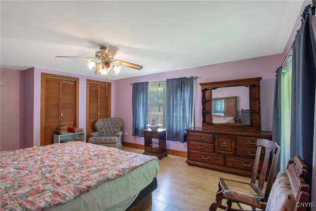 338 Dutch Hill Rd Unit 326, Parish, NY 13167 - bedroom with two closets, ceiling fan, and light wood-type flooring