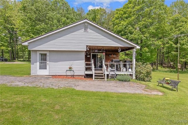 338 Dutch Hill Rd Unit 326, Parish, NY 13167 - rear view of property featuring a lawn