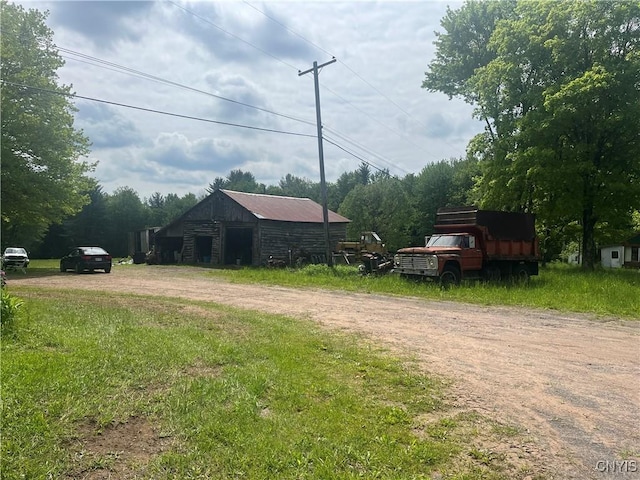 338 Dutch Hill Rd Unit 326, Parish, NY 13167 - view of street with a pole building