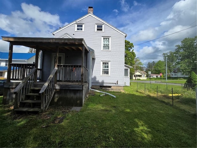 78 W Main St, Sidney, NY 13838 - back of house featuring a chimney