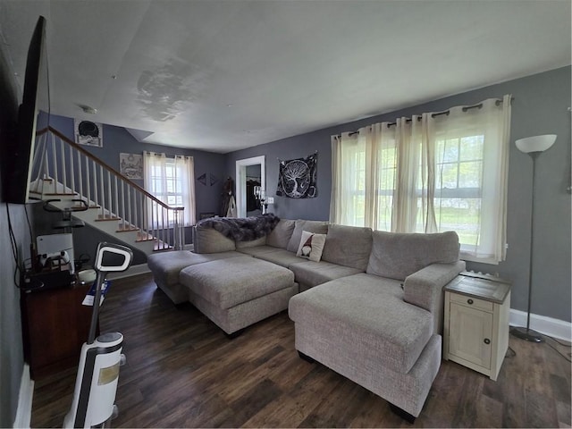 78 W Main St, Sidney, NY 13838 - living room with stairway, dark wood-style floors, and baseboards