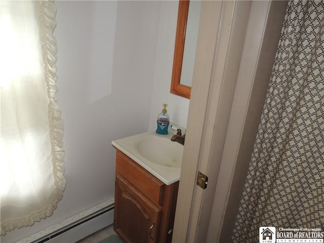 3931 S Ralph Ave, Ellery, NY 14712 - full bathroom with baseboard heating and vanity