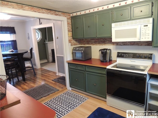 3931 S Ralph Ave, Ellery, NY 14712 - kitchen with electric range, white microwave, green cabinetry, and light wood-style floors
