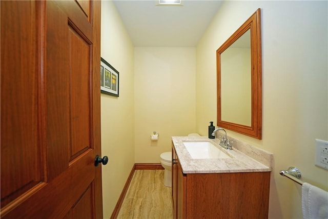 9867 State Route 961f Rd, Burns, NY 14807 - bathroom with vanity, toilet, baseboards, and wood finished floors