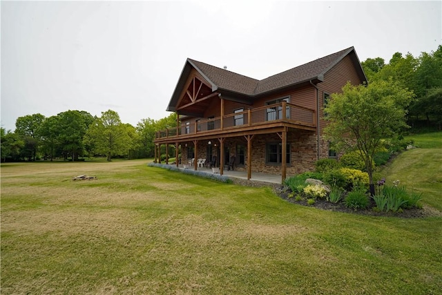 9867 State Route 961f Rd, Burns, NY 14807 - back of property featuring a lawn, stone siding, a patio area, and a wooden deck