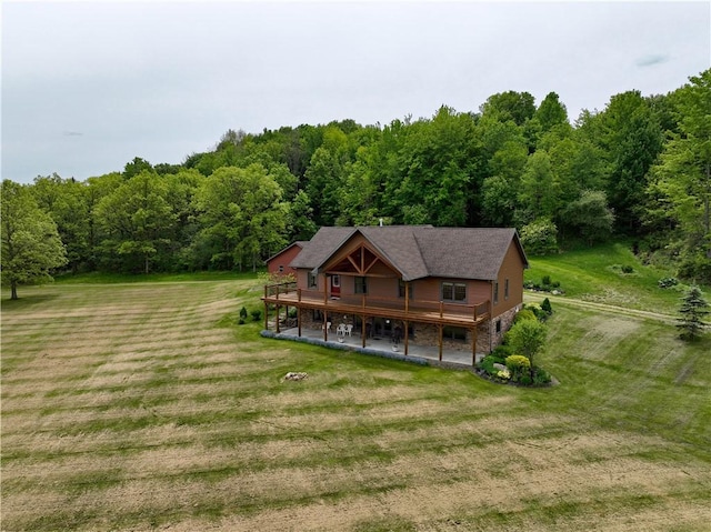 9867 State Route 961f Rd, Burns, NY 14807 - view of front of home featuring a wooden deck, a front yard, a view of trees, and a patio area