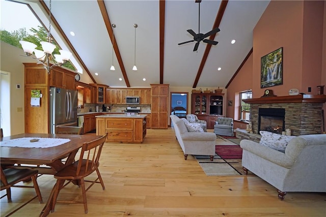 9867 State Route 961f Rd, Burns, NY 14807 - living room featuring high vaulted ceiling, beamed ceiling, light wood-style flooring, a chandelier, and a fireplace