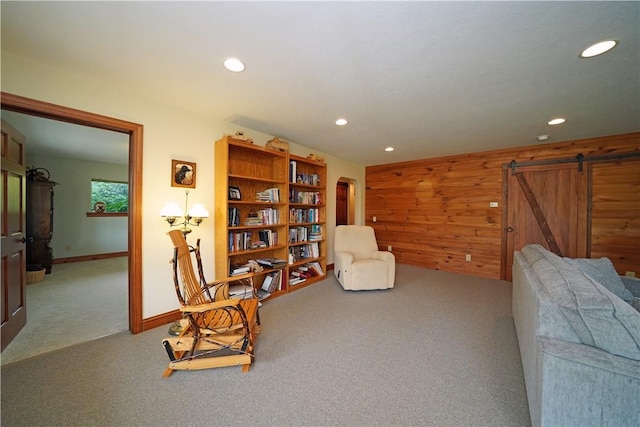 9867 State Route 961f Rd, Burns, NY 14807 - sitting room with carpet floors, recessed lighting, wood walls, arched walkways, and a barn door