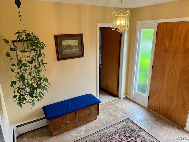 107 Rosewell Mdw, Dewitt, NY 13214 - foyer featuring a chandelier, a baseboard radiator, baseboards, and stone finish flooring