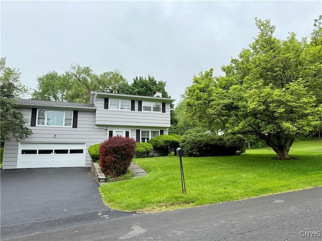 107 Rosewell Mdw, Dewitt, NY 13214 - view of front of house with driveway, an attached garage, a front lawn, and a chimney