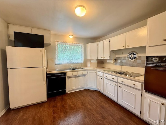 107 Rosewell Mdw, Dewitt, NY 13214 - kitchen with black appliances, white cabinets, dark wood-style floors, light countertops, and decorative backsplash