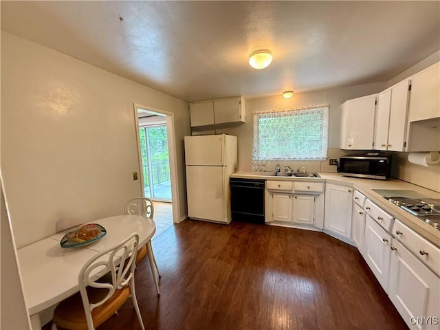 107 Rosewell Mdw, Dewitt, NY 13214 - kitchen with black dishwasher, freestanding refrigerator, stainless steel microwave, and plenty of natural light