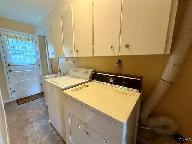 107 Rosewell Mdw, Dewitt, NY 13214 - washroom with cabinet space, separate washer and dryer, and baseboards