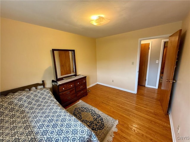 107 Rosewell Mdw, Dewitt, NY 13214 - bedroom featuring light wood finished floors and baseboards