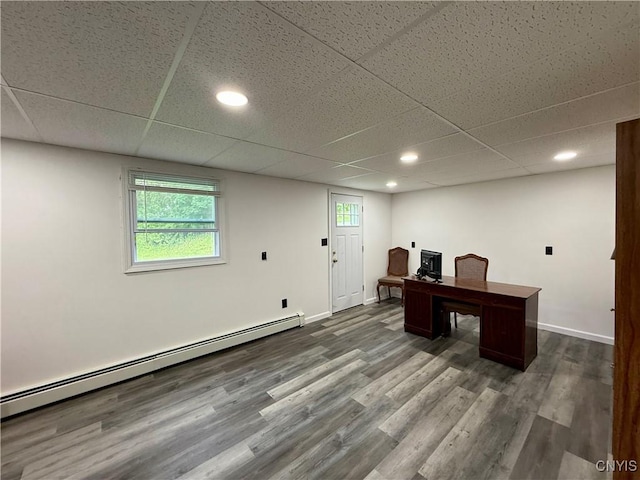 107 Rosewell Mdw, Dewitt, NY 13214 - unfurnished office featuring a paneled ceiling, a baseboard heating unit, dark wood-type flooring, baseboards, and recessed lighting