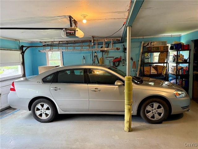 107 Rosewell Mdw, Dewitt, NY 13214 - garage featuring a garage door opener