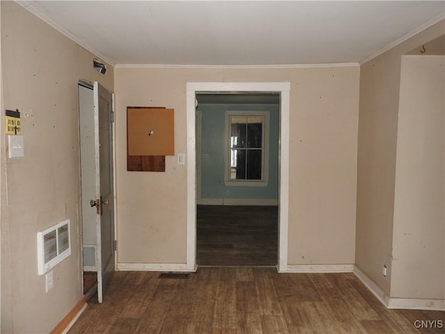 1893 Preble Rd, Preble, NY 13141 - spare room with wood finished floors, baseboards, ornamental molding, and heating unit