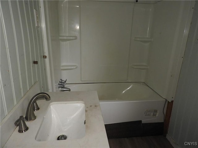1893 Preble Rd, Preble, NY 13141 - bathroom with shower / bathtub combination, vanity, and wood finished floors