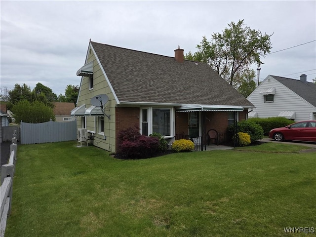 4654 Patricia Dr, Niagara Falls, NY 14305 - view of front of house featuring a shingled roof, a chimney, and brick siding