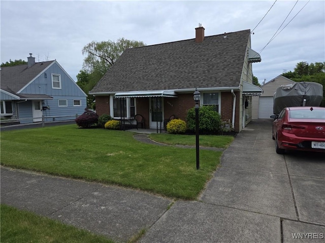 4654 Patricia Dr, Niagara Falls, NY 14305 - view of front of home with roof with shingles, brick siding, a front yard, and a chimney