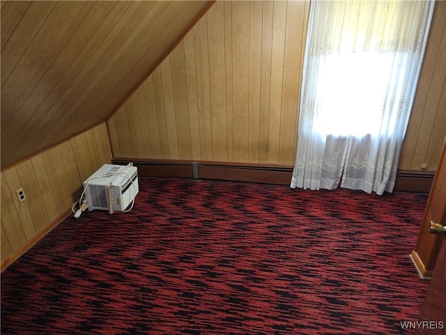 4654 Patricia Dr, Niagara Falls, NY 14305 - bonus room with wooden walls, vaulted ceiling, and carpet flooring