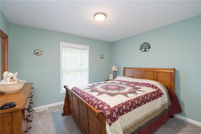 8484 Laura Ln, Richmond, NY 14471 - bedroom featuring light colored carpet and baseboards