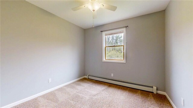 3638 Gorton Rd, Corning, NY 14830 - empty room with a baseboard radiator, carpet, ceiling fan, and baseboards
