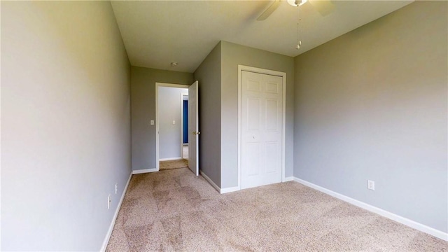 3638 Gorton Rd, Corning, NY 14830 - unfurnished bedroom featuring carpet, a closet, baseboards, and ceiling fan