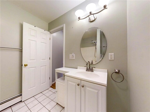3638 Gorton Rd, Corning, NY 14830 - bathroom featuring baseboard heating, vanity, and tile patterned flooring