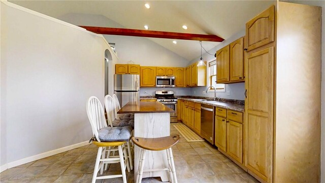 3638 Gorton Rd, Corning, NY 14830 - kitchen featuring stainless steel appliances, dark countertops, a sink, a breakfast bar, and recessed lighting