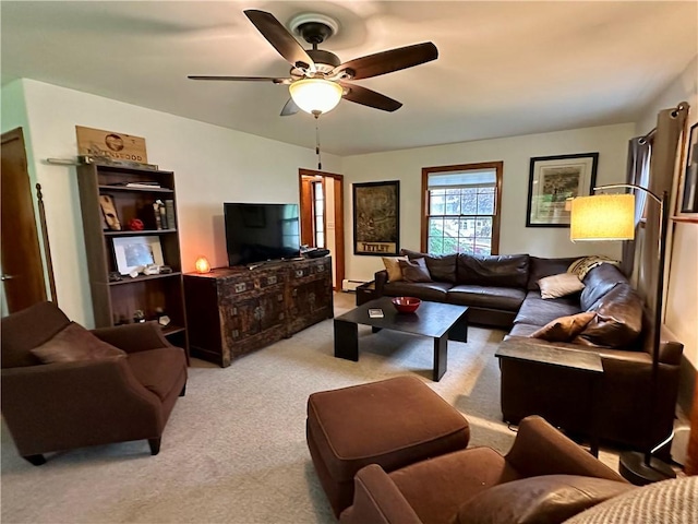 32 Bon Air Ave, Bradford-City, PA 16701 - living area with light carpet, baseboard heating, and a ceiling fan