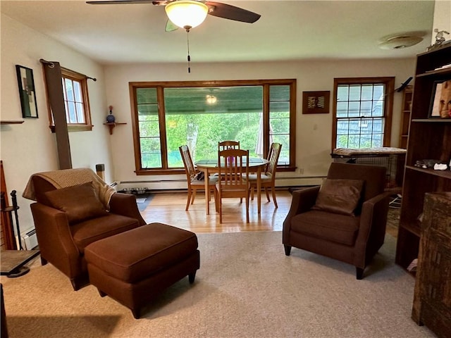 32 Bon Air Ave, Bradford-City, PA 16701 - living room featuring a baseboard radiator, a ceiling fan, and wood finished floors