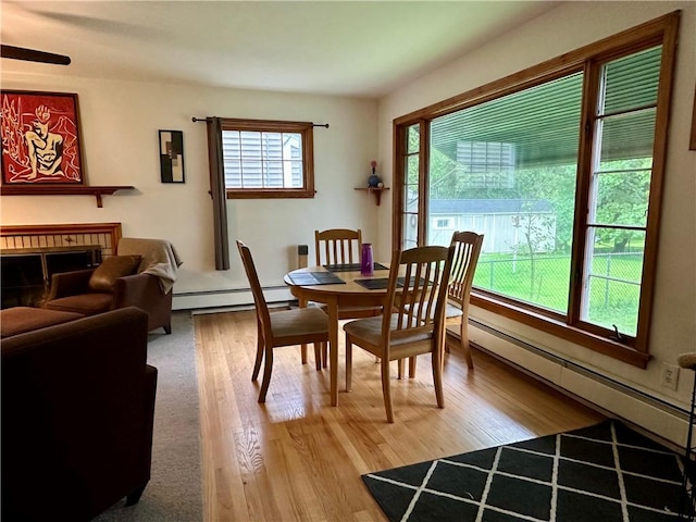 32 Bon Air Ave, Bradford-City, PA 16701 - dining room with a baseboard radiator and light wood finished floors